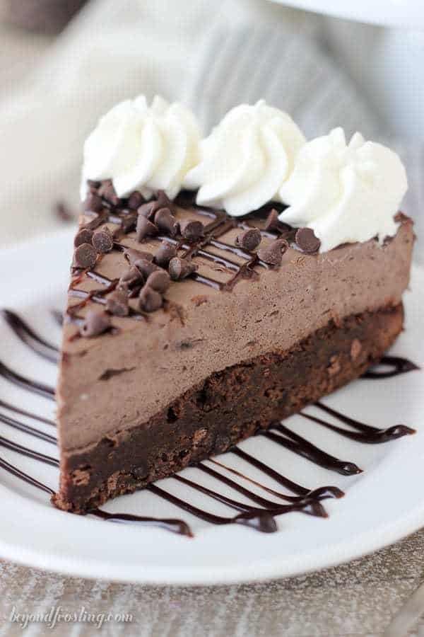 This Brownie Bottom Chocolate Mousse Cake is fudgy brownie is topped with a rich dark chocolate cream cheese mousse. This is the perfect dessert for your favorite chocolate lover.
