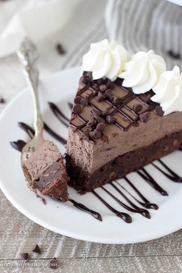 This Brownie Bottom Chocolate Mousse Cake is a rich fudgy brownie is topped with a decadent dark chocolate cheesecake mousse. It is a chocolate lovers dream!