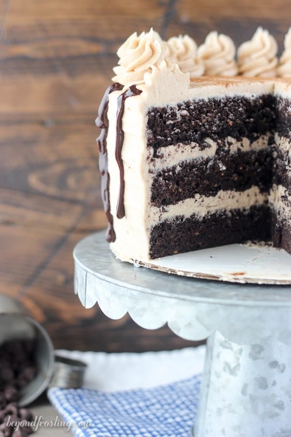 Sliced chocolate sweet potato cake on a stand.