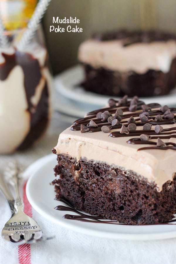 This Mudslide Poke Cake is a dark chocolate cake soaked in a spiked chocolate ganache, Kahlua Chocolate Pudding and a spiked chocolate mousse on top. There’s plenty of chocolate and booze to go around.