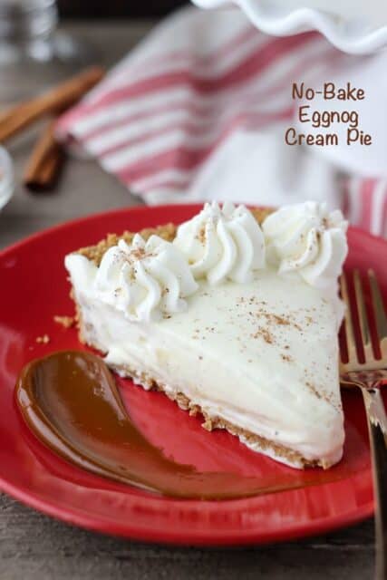 This No-Bake Eggnog Cream Pie is made with a graham cracker crust, and homemade eggnog pudding mixed with whipped cream to create a light and airy mousse like dessert. This pie is a great make-ahead of time dessert for the holidays.