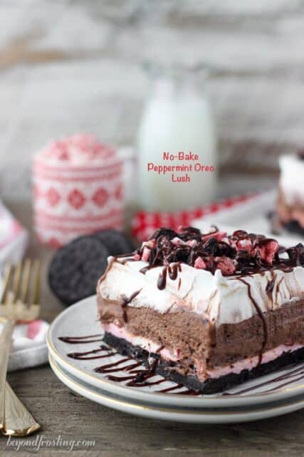 picture of peppermint Oreo lush on a plate titled "No-Bake Peppermint Oreo Lush"