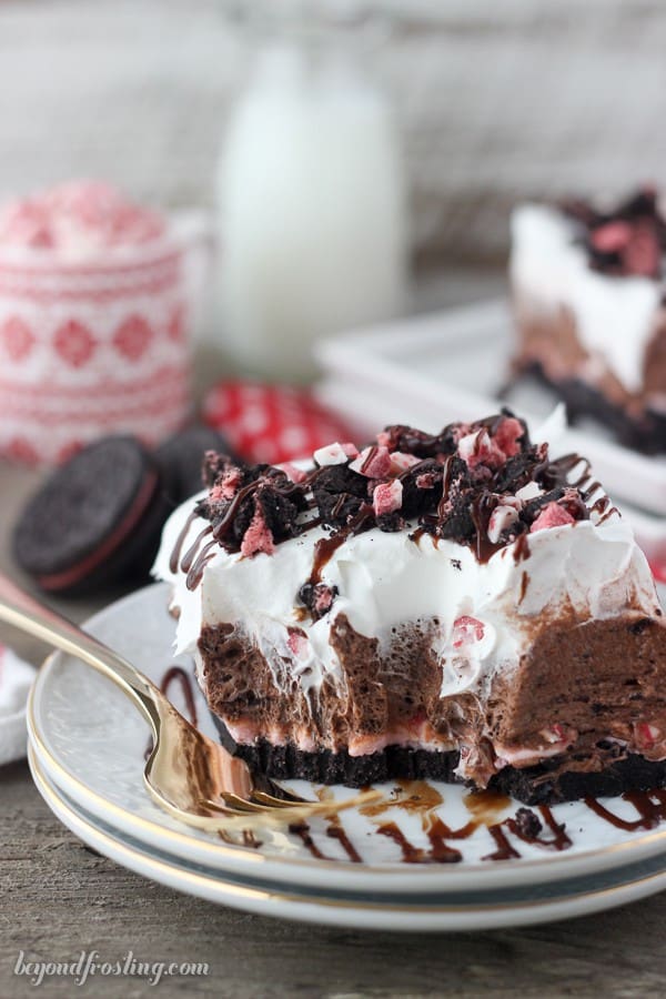 slice of peppermint Oreo lush on a plate with bites taken out