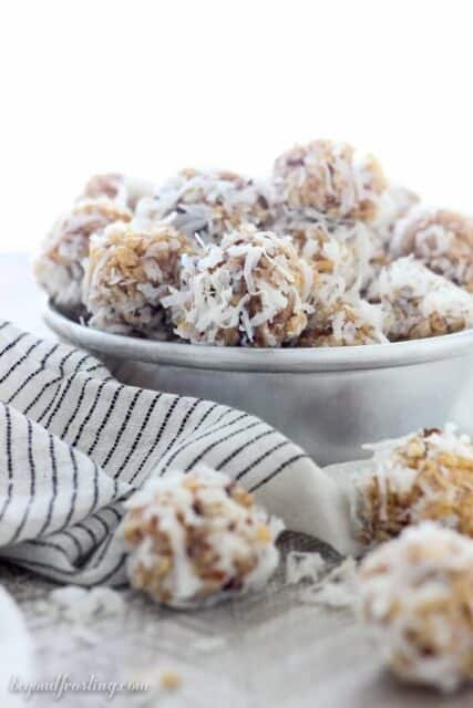 These No-Bake Coconut Krispie Date Balls are made with dates and Rice Krispies and rolled in coconut. This classic Christmas cookie is a requirement in my house!