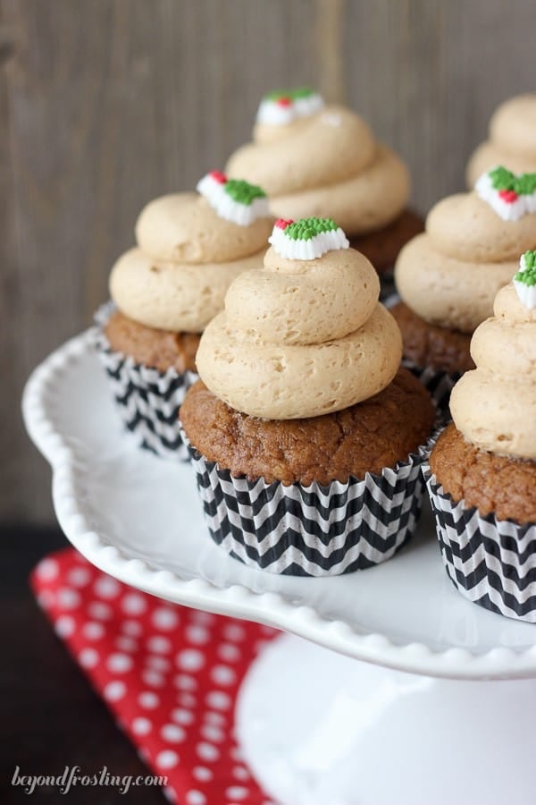 Gingerbread cupcakes on a cake stand.