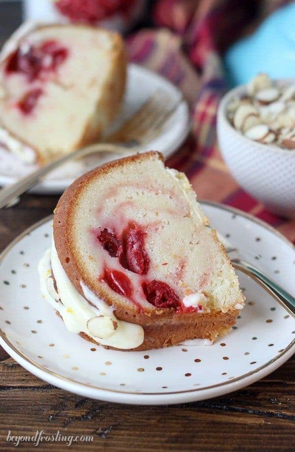 Sink your teeth into this Cherry Almond Bundt Cake. The dense almond pound cake is filled with a cherry pie filling and topped with a cream cheese glaze.