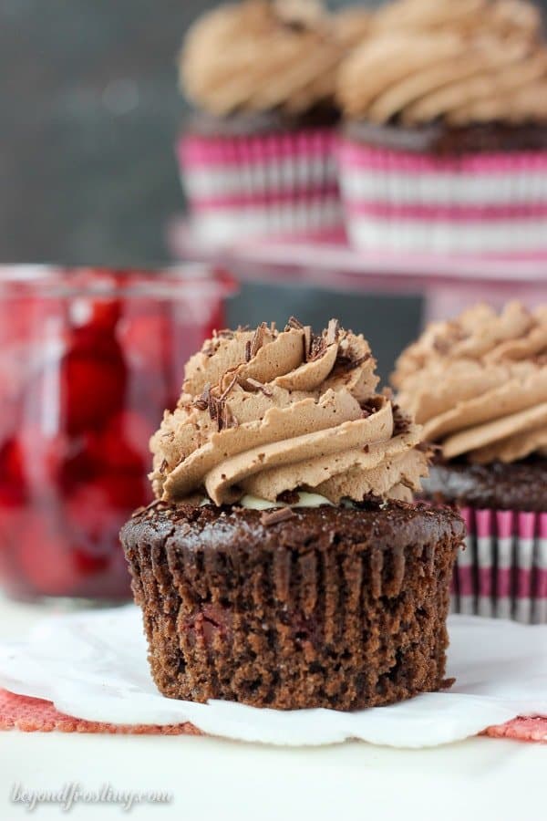 Just one bite is all you need to fall in love with these Chocolate Cherry Cream Pie Cupcakes. These chocolate cupcakes are baked with cherry pie filling, filled with a cheesecake mousse and they’re topped with chocolate whipped cream.