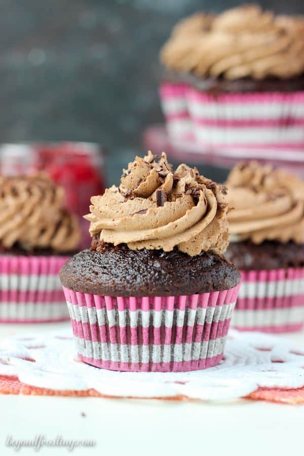 These Chocolate Cherry Cream Pie Cupcakes are a chocolate cupcake filled with cherry pie filling, a cheesecake mousse and they’re topped with chocolate whipped cream.