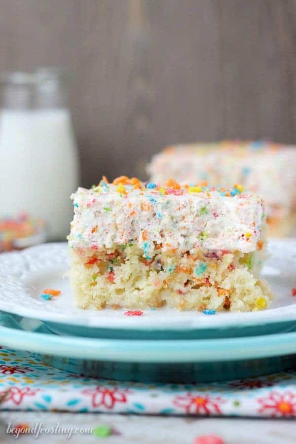 Fruity Pebble Cereal Milk Poke Cake - Beyond Frosting