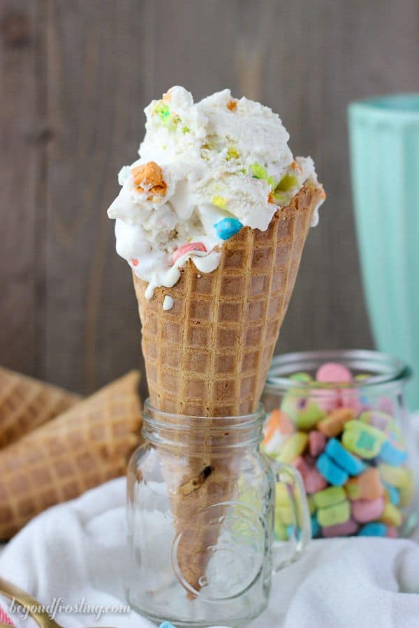 Cereal milk ice cream with Lucky Charms Marshmallows in an ice cream cone