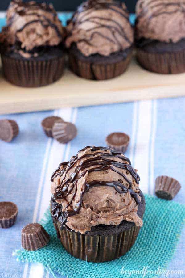 This Reese's Peanut Butter Cup Frosting is a chocolate frosting with crushed Reese's mini peanut butter cups. True Peanut Butter Cup fans will LOVE this frosting.