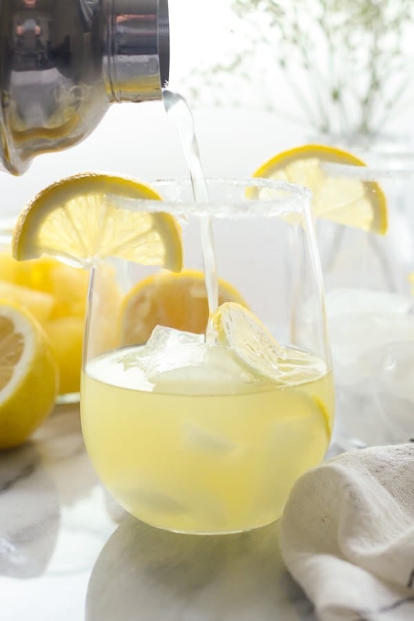 This Tequila Pineapple Punch is made with tequila, coconut rum, pineapple juice a splash of lemon juice and a little seltzer to top it off. It's the perfect balance of sweet verse tart.