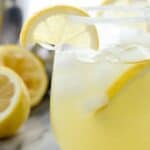 This Tequila Pineapple Punch is perfect for summer! It's made with tequila, coconut rum, pineapple juice a splash of lemon juice and a little seltzer to top it off.