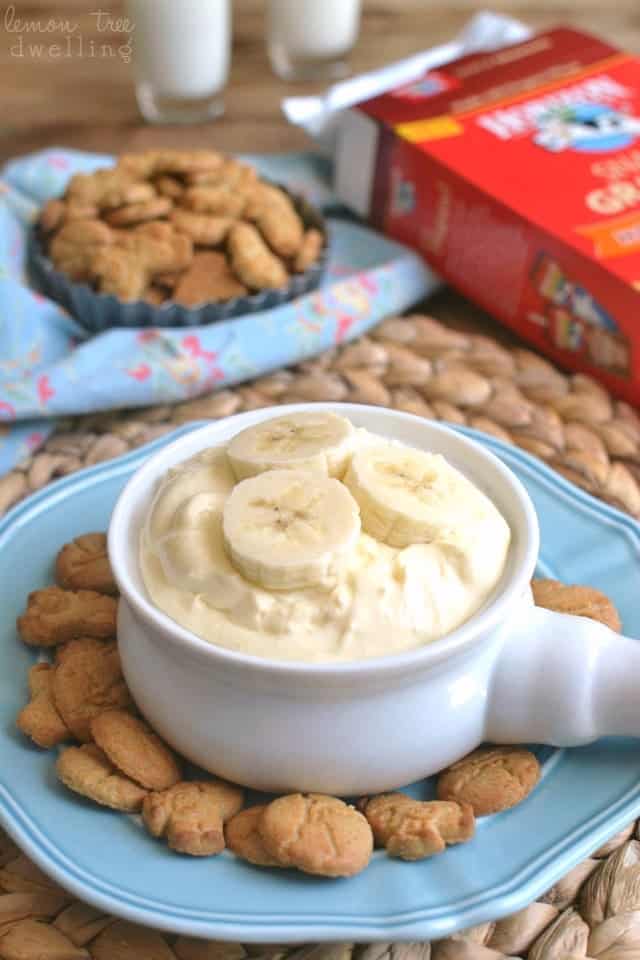 A Crock of Banana Cream Pie Dip on a Blue Plate