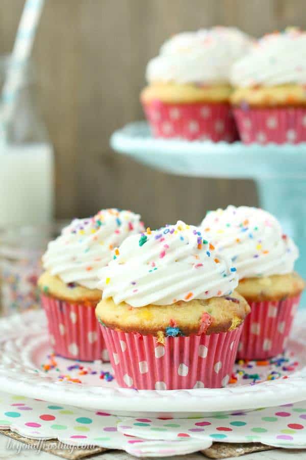 These Funfetti Cream Pie Cupcakes are triple the funfetti. It starts with a vanilla funfetti cupcakes, then it’s filled with an easy vanilla mousse. Finally it's topped with a batch of cake batter whipped cream.