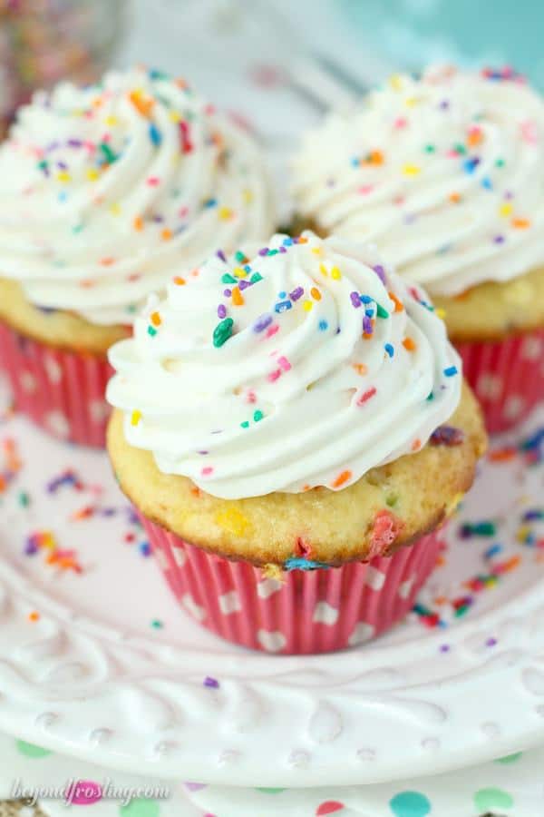 These Funfetti Cream Pie Cupcakes are triple the funfetti. It starts with a vanilla funfetti cupcakes, then it’s filled with an easy vanilla mousse. Finally it's topped with a batch of cake batter whipped cream.