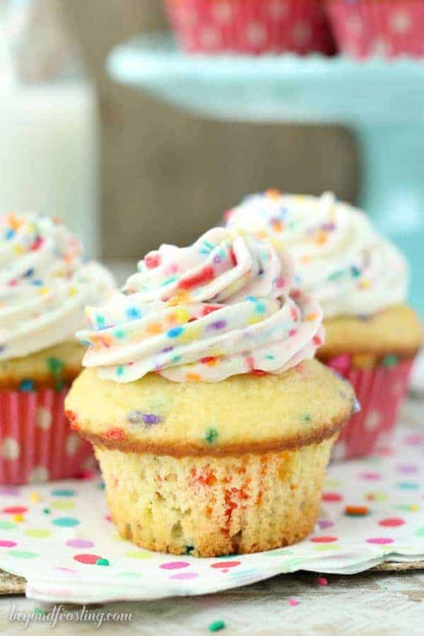 Triple Funfetti Cream Pie Cupcakes are the best funfetii cupcakes you’ll ever eat. It starts with a vanilla funfetti cupcakes, then it’s filled with an easy vanilla mousse. Finally it's topped with a batch of cake batter whipped cream.