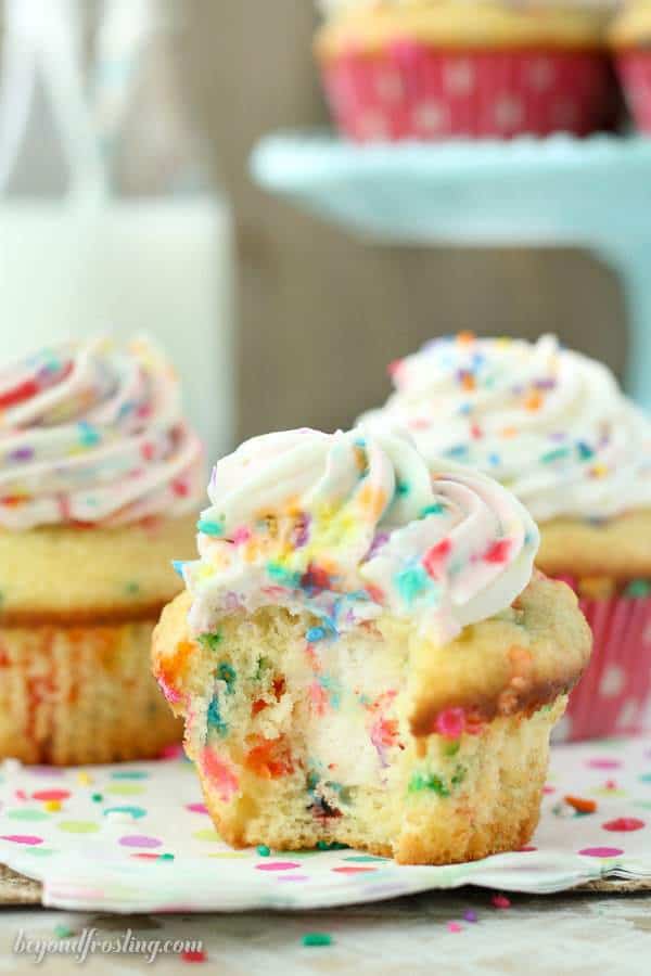 These Funfetti Cream Pie Cupcakes are triple the funfetti. It starts with a vanilla funfetti cupcakes, then it’s filled with an easy vanilla mousse. Finally it's topped with a batch of cake batter whipped cream.