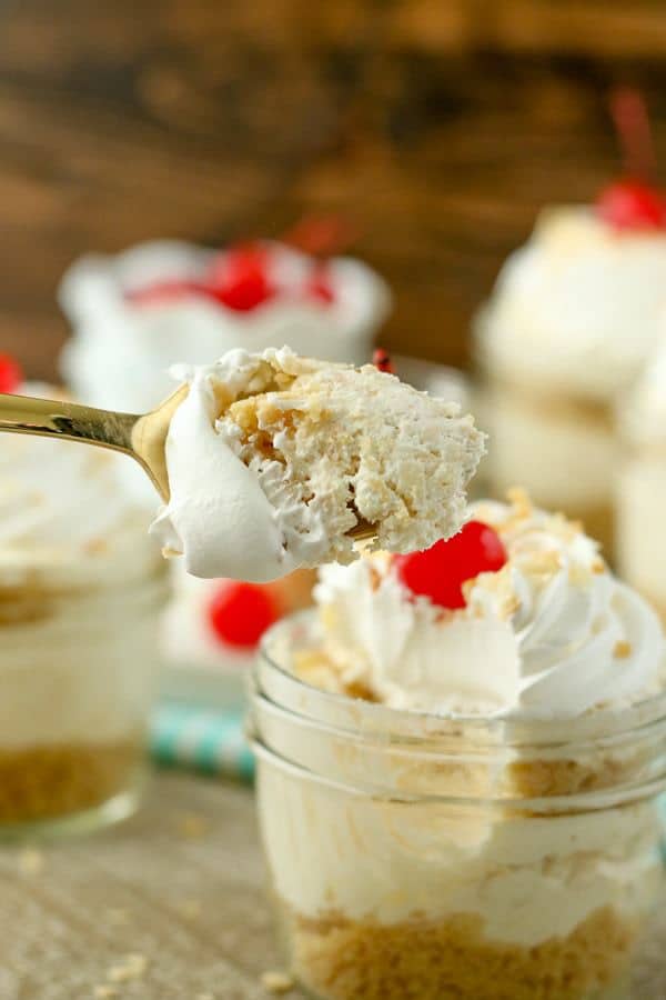 Grab a spoon and dig into these No-Bake Piña Colada Cheesecake Parfaits. These layers parfaits have a golden Oreo cookie crust, a creamy pineapple coconut cheesecake filling and a whipped cream topping.