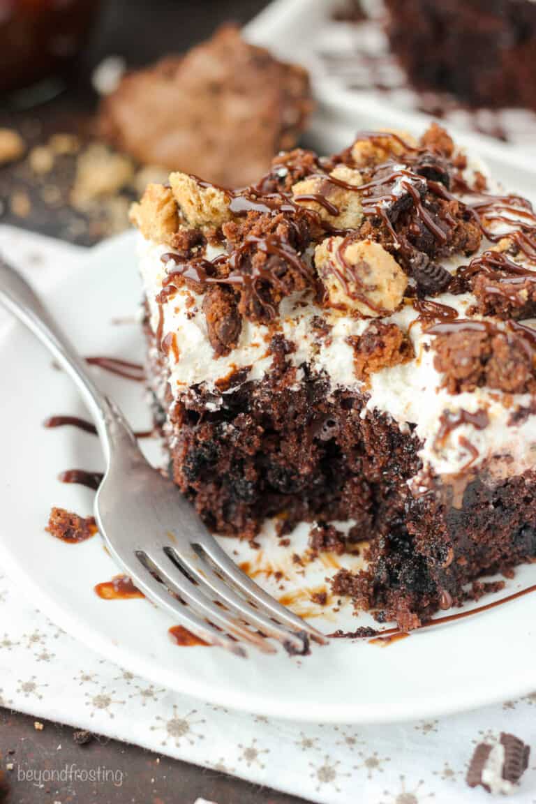 Decadent Slutty Brookie Poke Cake l Beyond Frosting