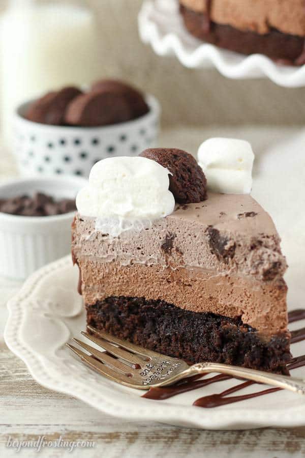 Triple Chocolate Brownie Mousse Cake, every layer is better than the next. A fudgy brownie on the bottom, a layer of chocolate mousse and finally a layer of brownie batter mousse. This is a must-have recipe.