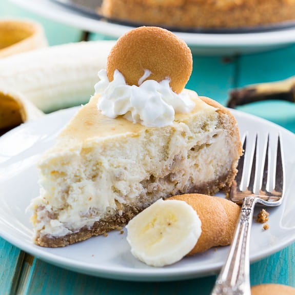 A Piece of Banana Pudding Cheesecake on a Plate with a Fork