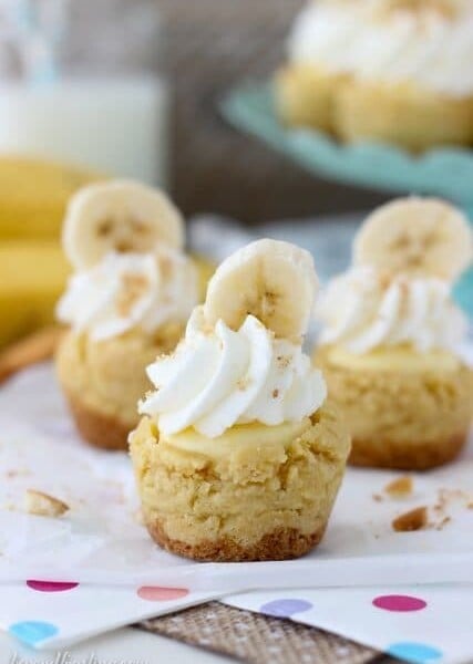 3 Banana Cream Pie Cookie Cups Filled with Banana Cream Mousse and Topped with Whipped Cream and Sliced Bananas