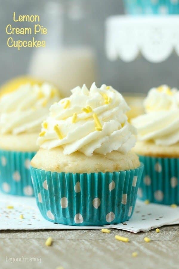 Impress your friends with these luscious Lemon Cream Pie Cupcakes. A fresh vanilla cupcake with a delicate lemon mousse and topped with cream cheese whipped cream.