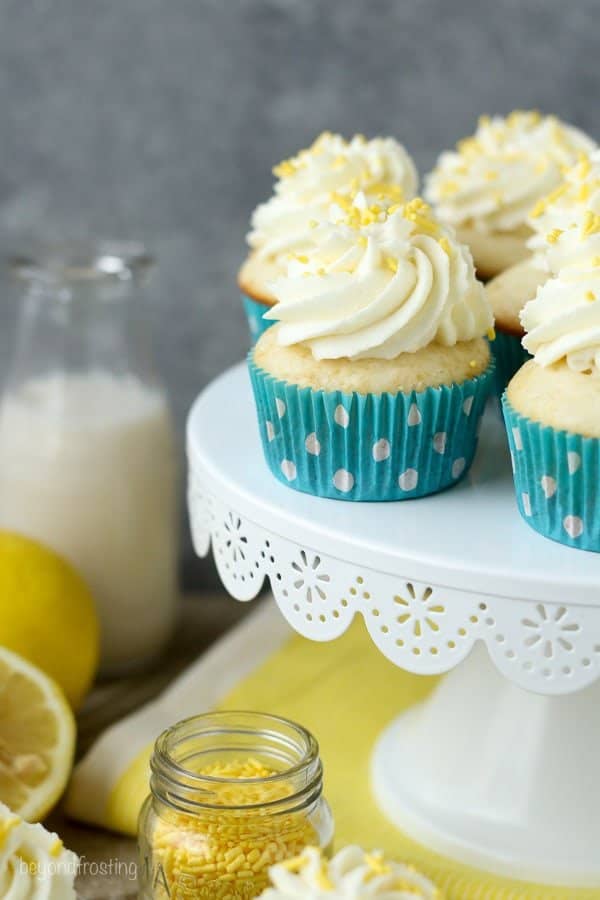 Impress your friends with these luscious Lemon Cream Pie Cupcakes. A fresh vanilla cupcake with a delicate lemon mousse and topped with cream cheese whipped cream.