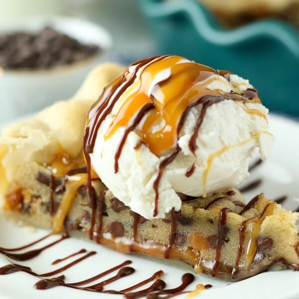 This Million Dollar Cookie Pie is layer of Nutella, Dulce De Leche and Cookie Dough in a buttery pie crust. Every layers makes this dessert a million bucks!