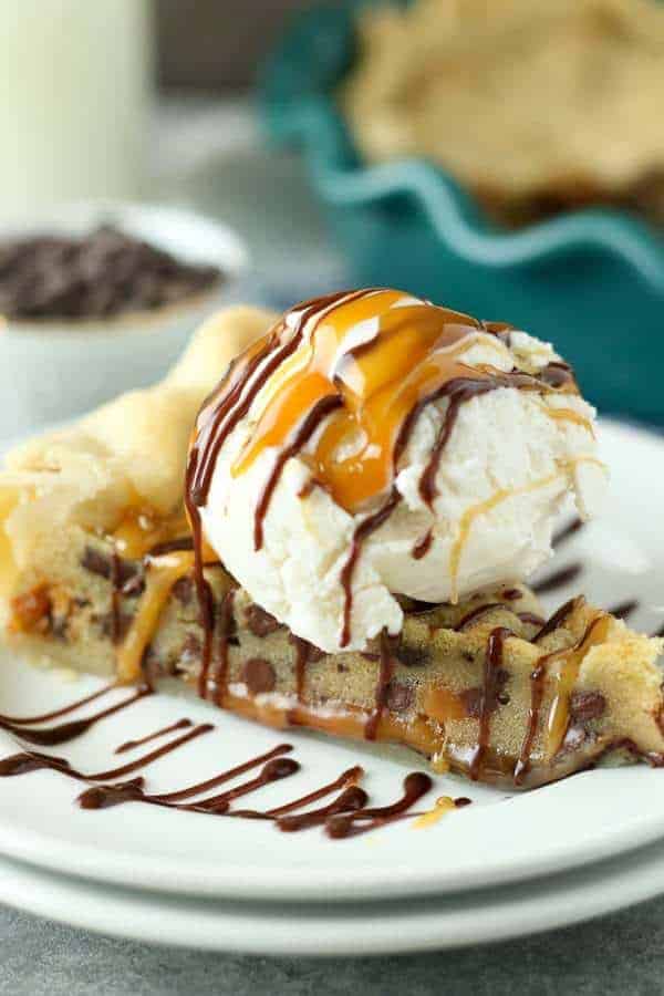This Million Dollar Cookie Pie is layer of Nutella, Dulce De Leche and Cookie Dough in a buttery pie crust. Every layers makes this dessert a million bucks!