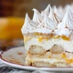 Summer time is the perfect time for No-Bake Peach Icebox Cake. Layers of bourbon and cinnamon soaked ladyfingers, mascarpone cheese and peach pie filling. Make sure you get a little bit of every layer in each bite.