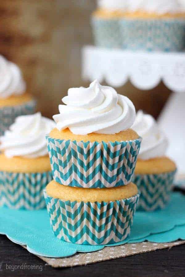 These Skinny Orange Creamsicle Cupcakes are full of flavor but without all the extra calories! These lighten up cupcakes are topped with a whipped topping.