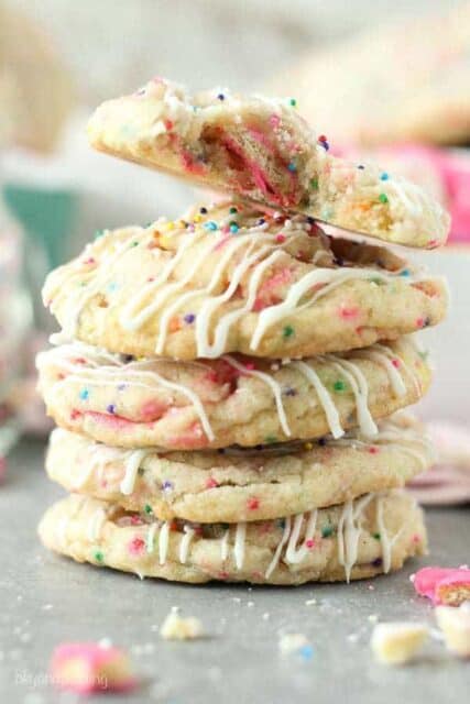 These Circus Animal Stuffed Cookies are soft and chewy and filled with frosted circus animal cookies, with a drizzle of white chocolate and sprinkles on top.