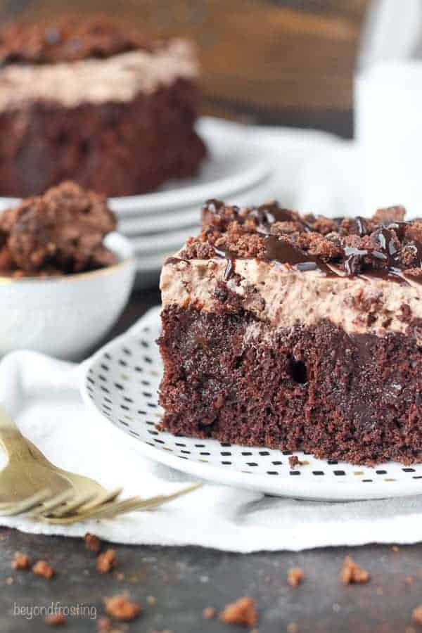 Sinful Brownie Batter Poke Cake. This chocolate poke cake is soaked with dark chocolate pudding, and topped a brownie batter mousse and brownie batter glaze. It’s for true chocolate lovers.