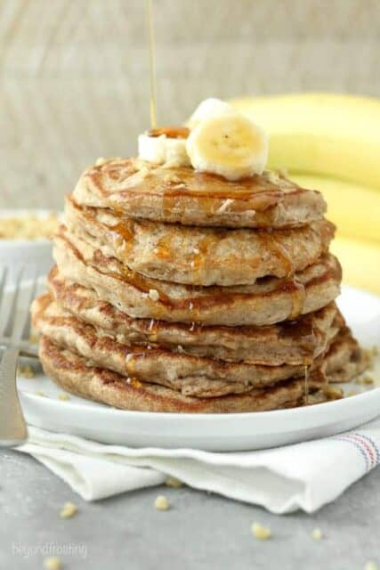 Walnut Protein Pancakes come together in a snap. With fresh bananas, protein pancake mix a touch of cinnamon and a handful of walnuts, you’ll make these time and time again