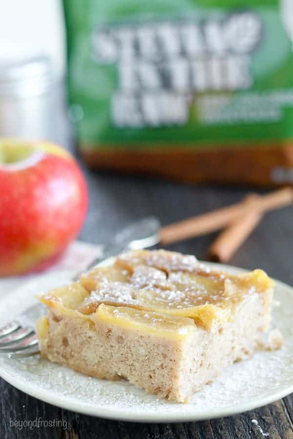 Satisfy your fall cravings with this Apple Upside Down Cake. This cake has a caramelized brown sugar topping with fresh sliced apples covered in a moist spice cake made with half the sugar of a normal cake.