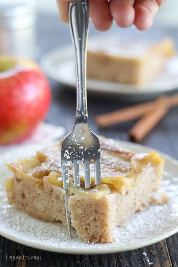 Get your hands on this Apple Upside Down Cake. This cake has a caramelized brown sugar topping with fresh sliced apples covered in a moist spice cake made with half the sugar of a normal cake.