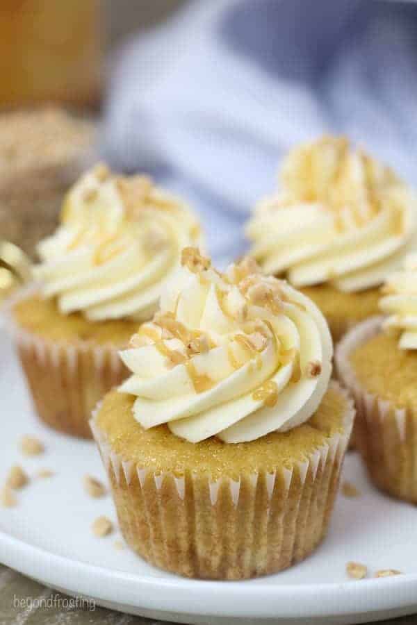 These Toffee Caramel Cupcakes with Bourbon Caramel Buttercream are homemade caramel based cupcakes with toffee pieces and it’s covered with a Bourbon Caramel frosting.