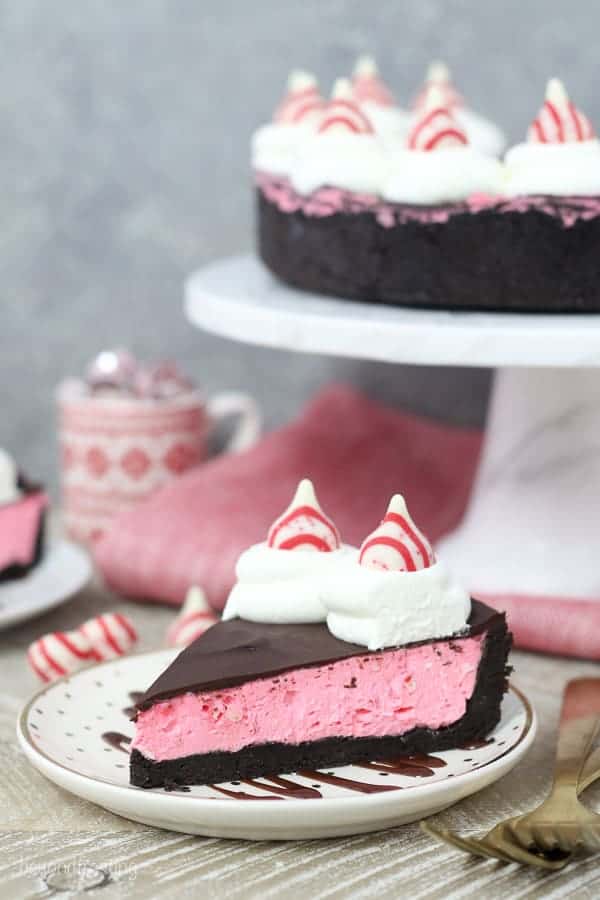 This No-Bake Peppermint Cheesecake starts with a thick Oreo crust. The peppermint cheesecake filling is topped off with a chocolate ganache and a dollop of whipped cream.