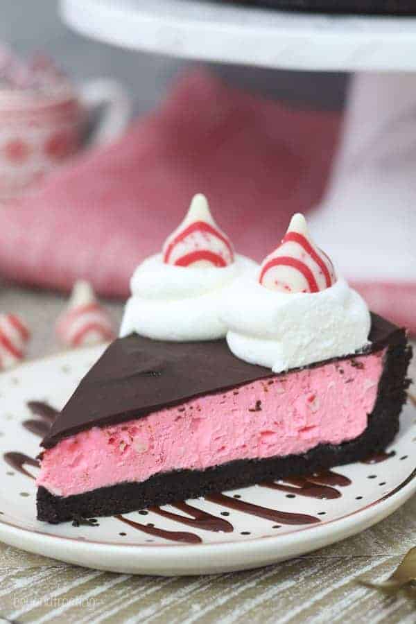 This No-Bake Peppermint Cheesecake starts with a thick Oreo crust. The peppermint cheesecake filling is topped off with a chocolate ganache and a dollop of whipped cream.