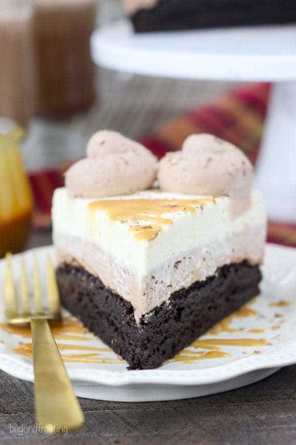 This decadent Caramel Hot Chocolate Brownie Mousse cake is three layers of dessert bliss. There is a layer of hot chocolate mousse and it’s topped with a caramel whipped cream.