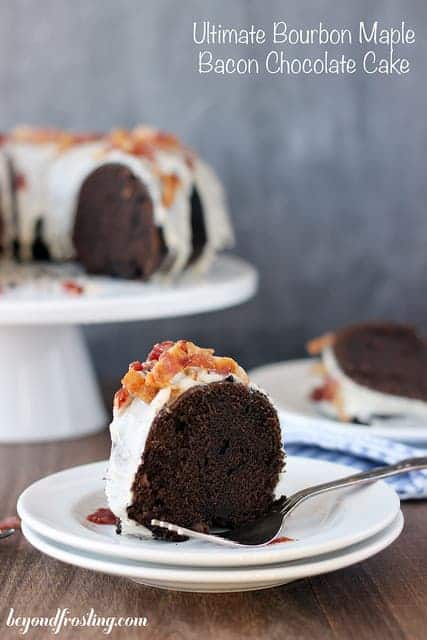 This slice of bacon cake is chocolatey and topped with yummy bourbon bacon crumbles and icing.