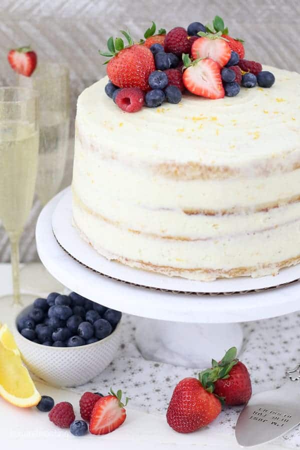 A marble cake stand with a 4 layer cake