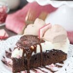 This Peppermint Bark Cheesecake Brownie is pretty much dessert bliss if you like peppermint. The bottom layer is a fudgy brownie and it topped with a peppermint crunch mousse that will knock your socks off. 