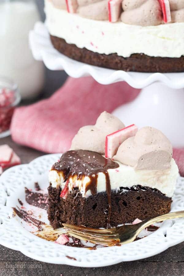 This Peppermint Bark Cheesecake Brownie is a fudgy brownie and it topped with a no-bake peppermint bark cheesecake that will knock your socks off.