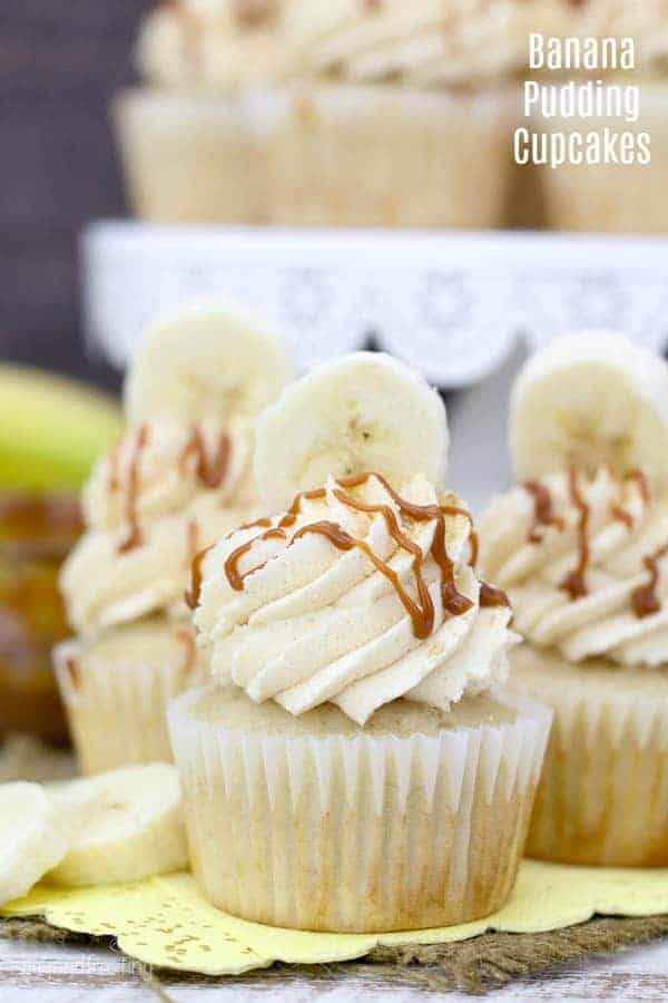 three banana cupcakes on a yellow napkin