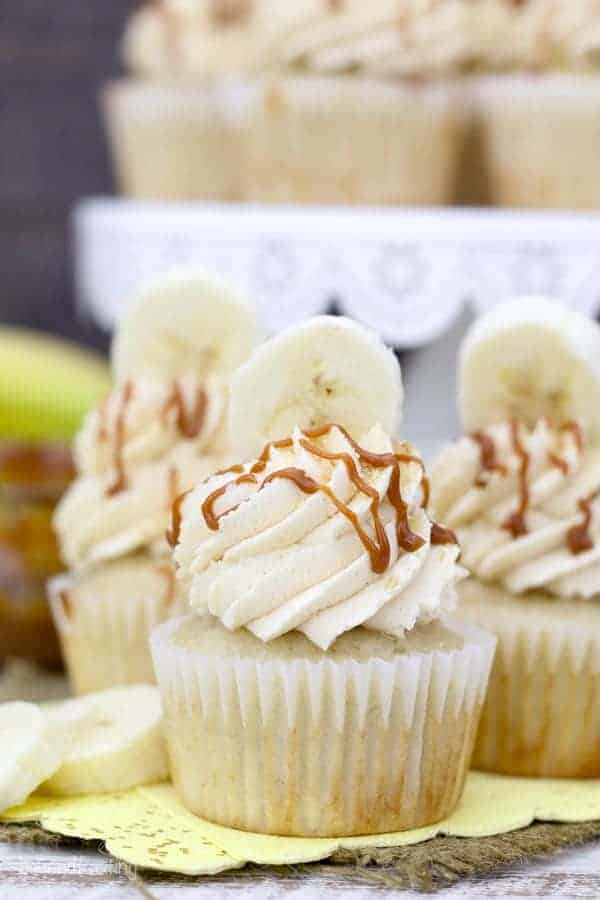 three banana cupcake on a yellow napkin