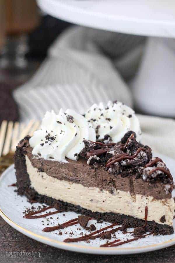 A double layer mousse pie with crushed Oreos on top