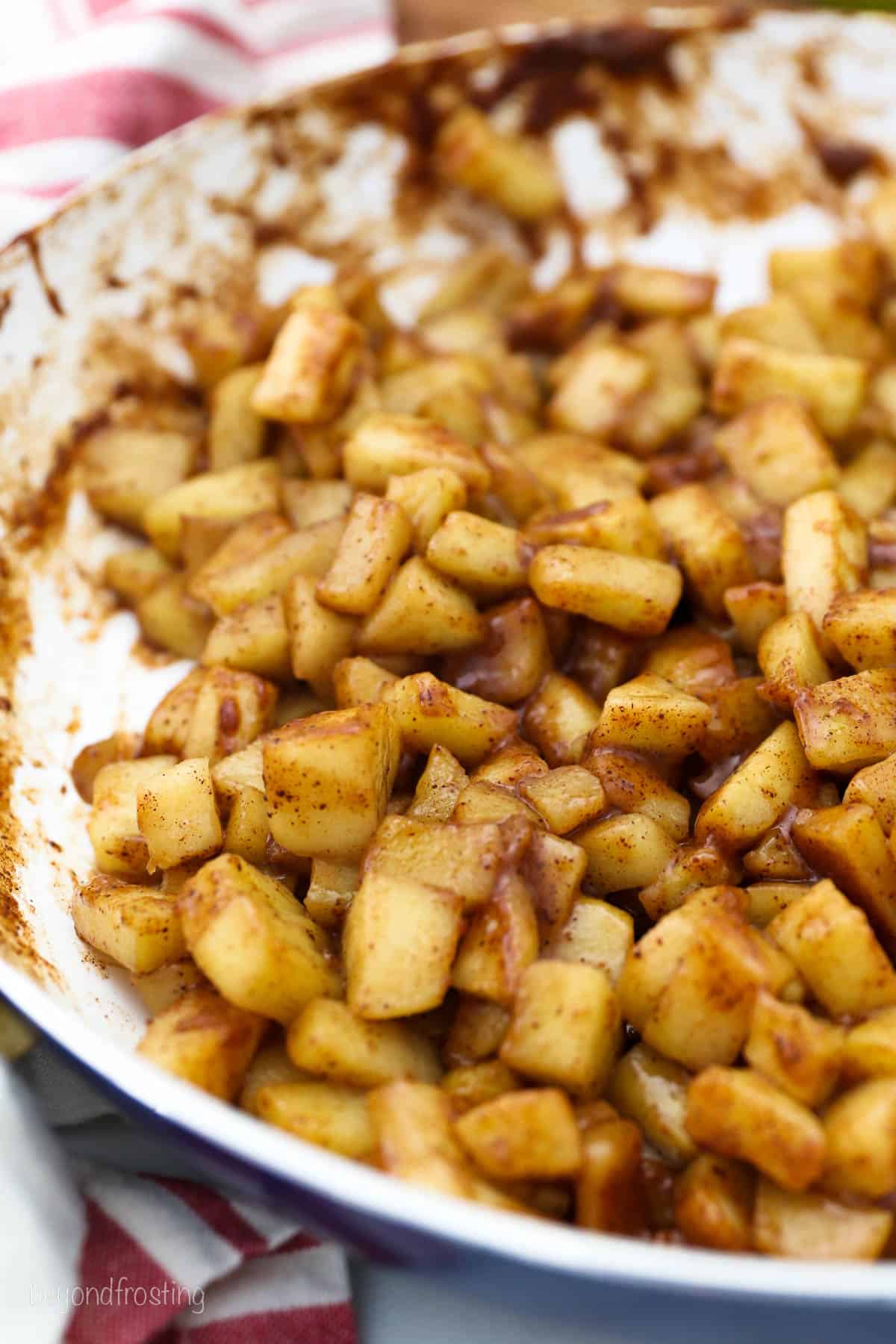 Caramelized apple pie filling in a skillet.